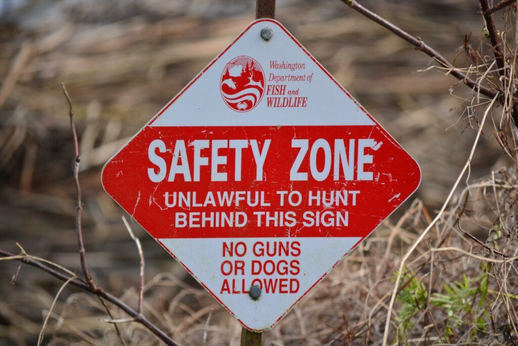 a red and white sign - Fir Island, WA - Wiley Slough 'Safety Zone' sign