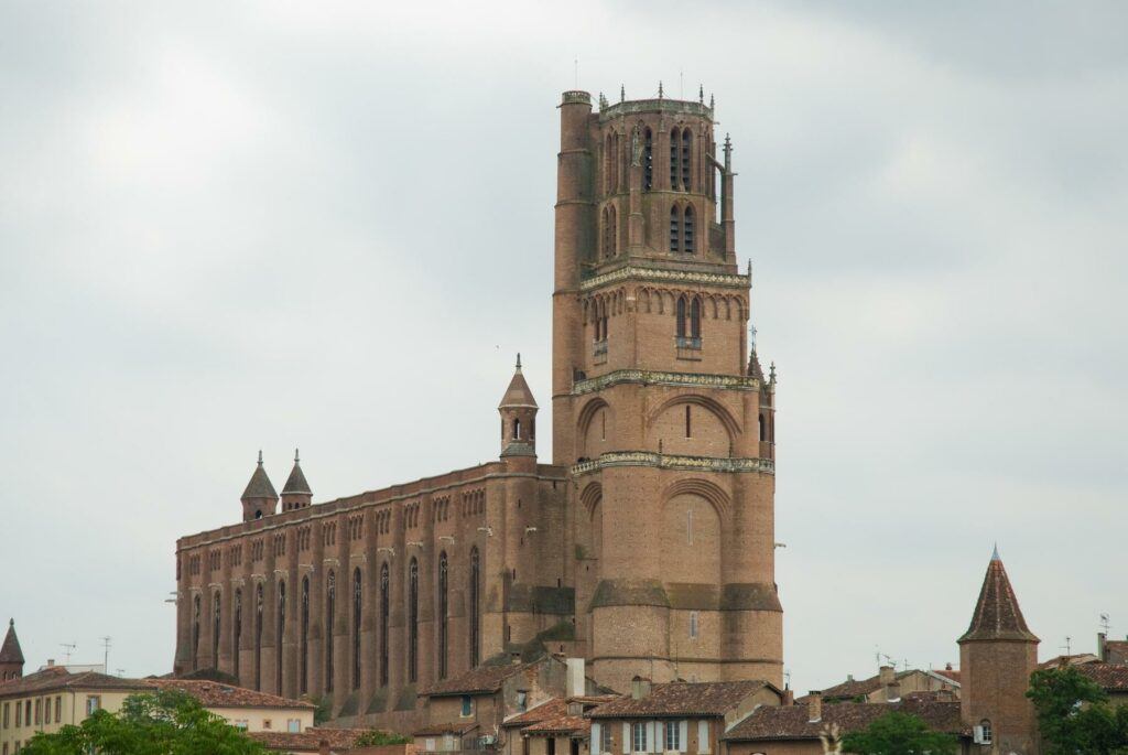 Albi cathedral - outdoor view - Image of outdoors, A group of people sitting around a campfire with